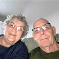 A Group Of People Posing For The Camera