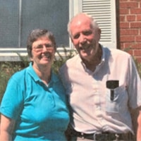 A Group Of People Posing For The Camera