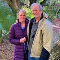 A Group Of People Posing For The Camera